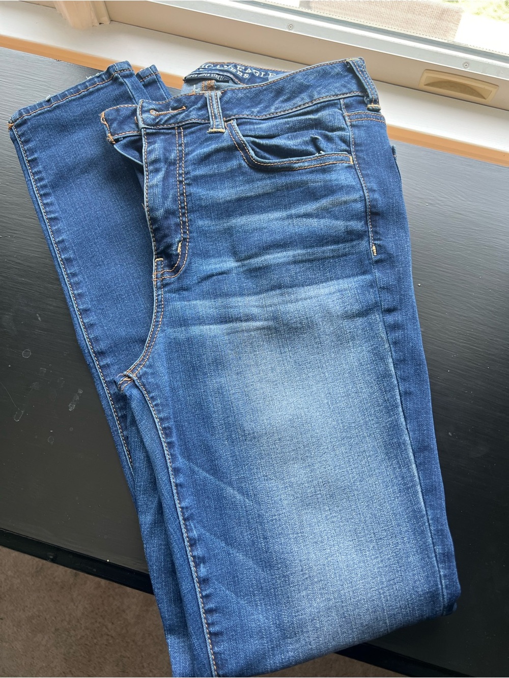 American Eagle Outfitters Women’s High-Rise Faded Blue Jeans